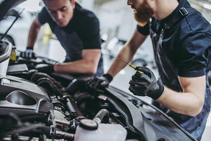 Certified Mechanics Servicing Heavy-Duty Diesel Engine
